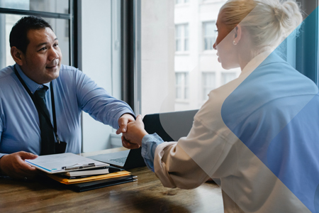 Stock image people in an interview to accompany article on hiring via an employer of record in Mexico.