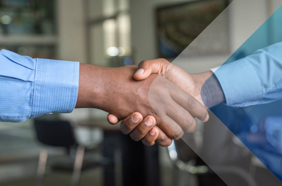 A handshake to show how headhunters in Africa can welcome new hires