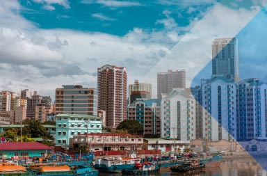 Waterside buildings in the Manila to illustrate article on hiring in the Philippines.