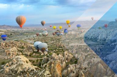 Balloons over Cappadocia to illustrate article on employer of record in Turkey. By Mar Cerdeira on Unsplash