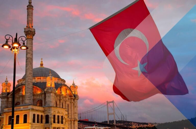 Turkish flag in front of mosque to illustrate article on employer of record in Turkey. ByMichael Jerrard on Unsplash.