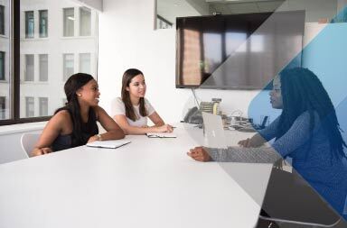 Women at table to illustrate article on recruiting as a service. By Christina Wocintech on Unsplash.