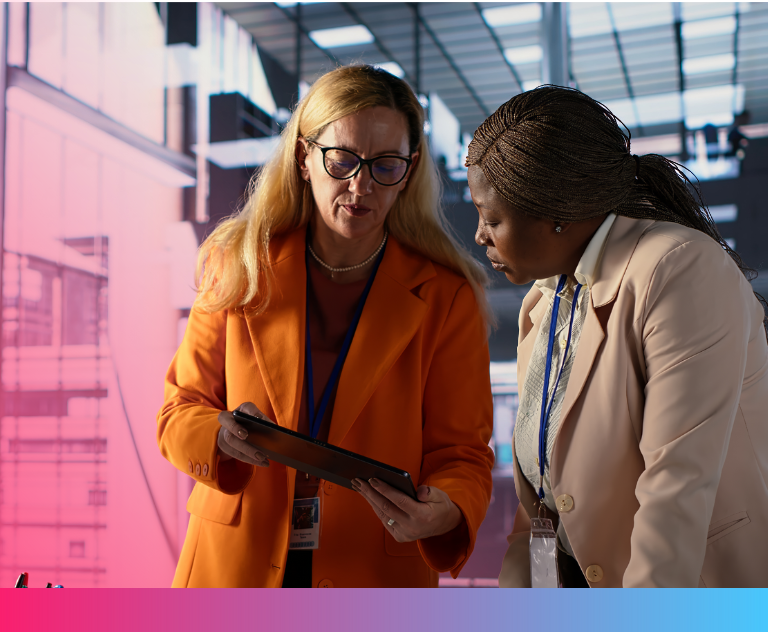 Business professionals discussing international expansion opportunities in a modern office setting